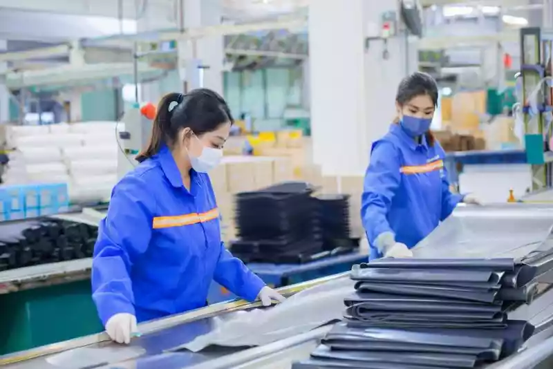 CNC PVC cutting machine preparing inflatable SUP fabric panels at Qingdao factory