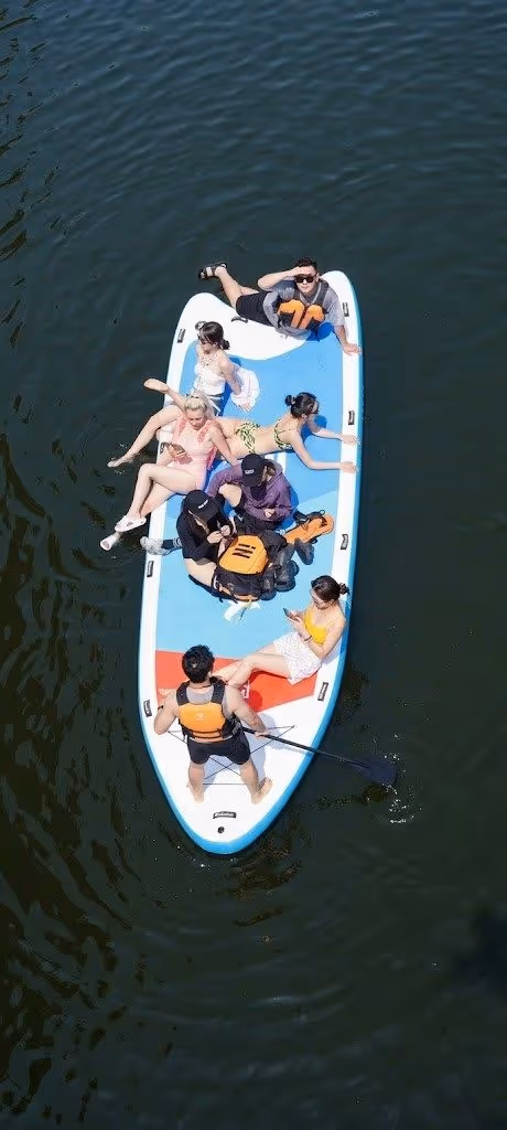 Giant SUP with multiple riders